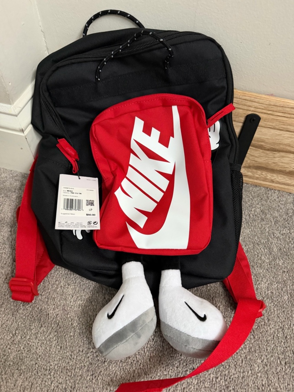 Nike Red and Black Backpack with Bold Swoosh